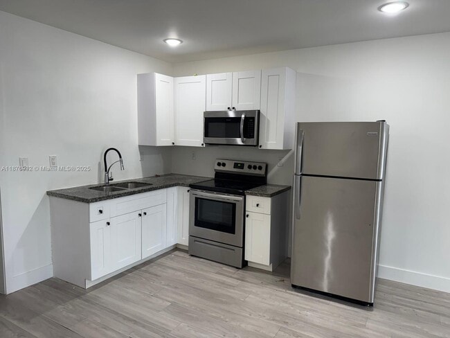Building Photo - 3146 NW 32nd St Unit A Rental