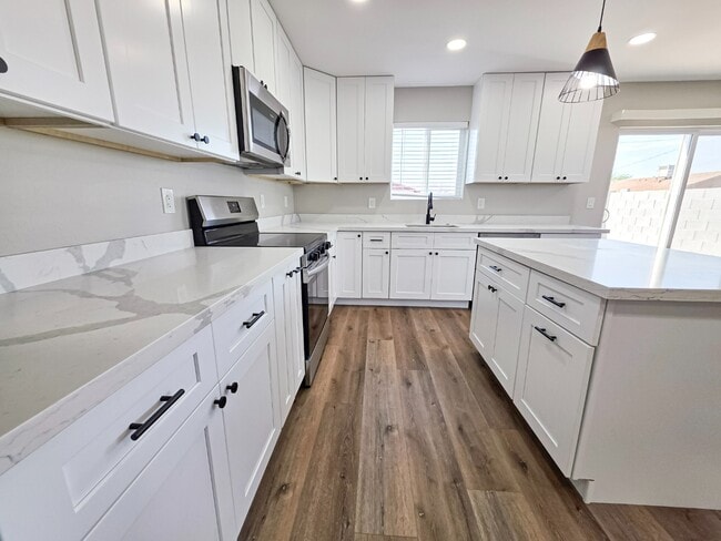 Photo - New Build 2025 Modern Duplex | 3 Bed, 2.5 Bath + Private Balcony & 2-Car Garage