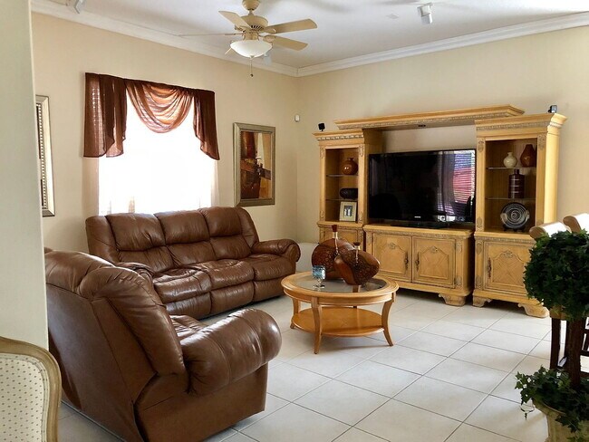 Photo - "Spacious 4-Bed Oasis with Granite Elegance & Pool in Miami Lakes"