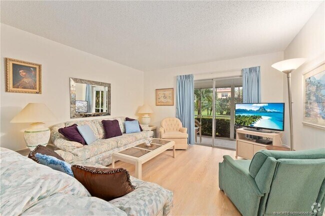 Building Photo - 1931 SW Palm City Rd Unit 16D Rental