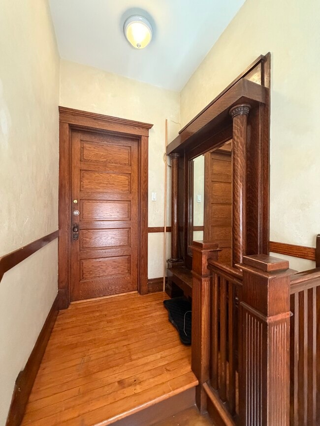 Entrance from within building to second floor unit