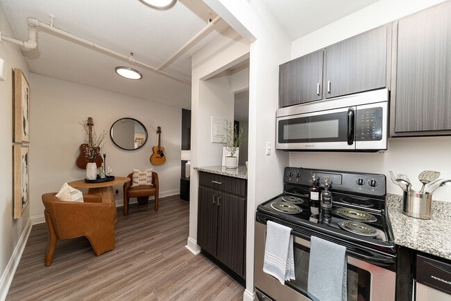 Kitchen with granite counters and stainless appliances