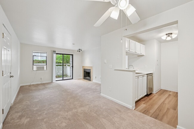 Classic Package III kitchen and living room with carpet (select homes)