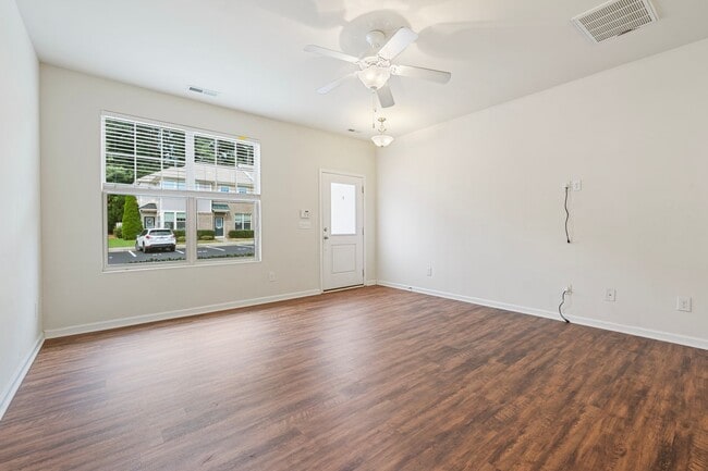 Photo - 2 Bedroom, 2.5 Bath townhome in Thompson Ridge with new LVP flooring downstairs.