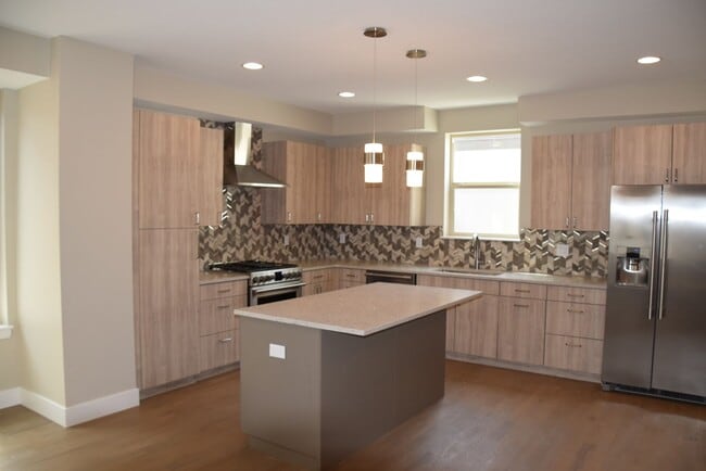 Photo - 3 bedroom / 3.5 bath Townhome + 2 Large Flex Spaces & Spacious Roof Top Deck!