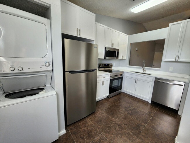 Building Photo - 2551 NW 56th Ave Unit 2-20