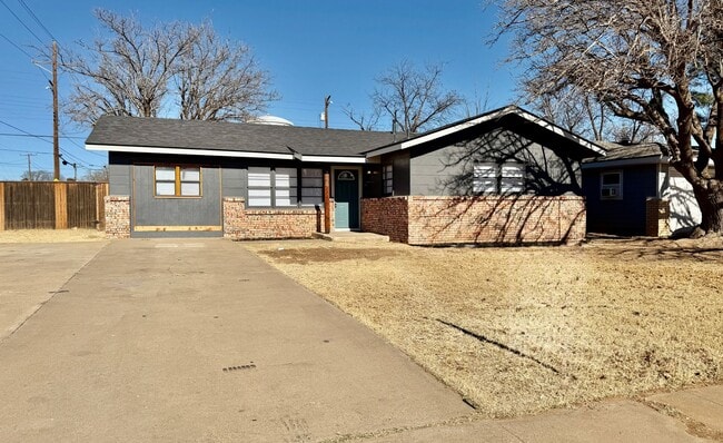 Photo - Fully Remodeled 4 Bedroom / 3 Bath Home with Two Primary Suites!