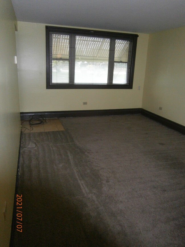 Building Photo - 1408 W 119th St Unit #1