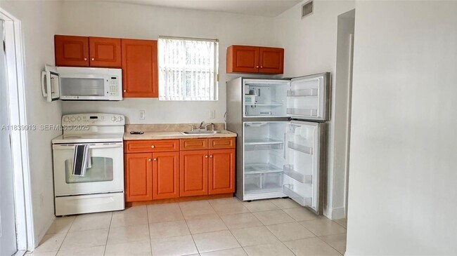 Photo - 2099 NW 26th Ave Unit 1-a