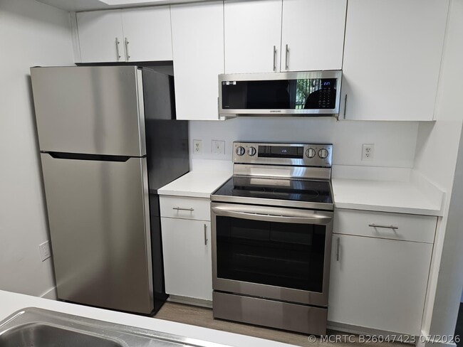 Building Photo - 12154 St.Andrews Pl Unit 206
