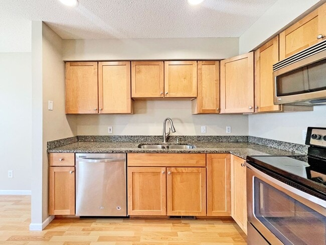 Photo - Beautifully Redone Modern Townhome with Large Deck, 2-Car Garage, Granite Kitchen, Vaulted Ceilin...