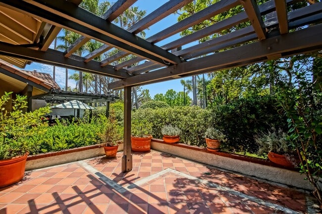 Photo - PRIME POOLFRONT LOCATION & CLOSE TO MAIN GATE! BRIGHT & SPACIOUS, END-UNIT POOLFRONT TOWNHOUSE W/...