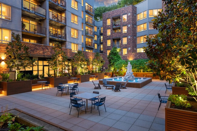 Relax and connect in the beautifully landscaped courtyard with comfortable gathering spaces