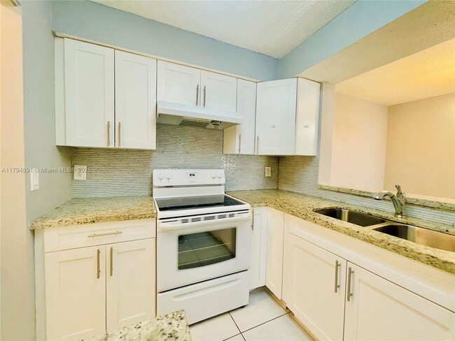 Building Photo - 1231 SW 46th Ave Unit 507A