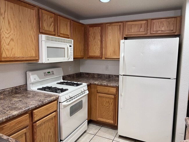 Photo - Wonderful 3 Br condo in gated community with the major appliances and 1 car garage.
