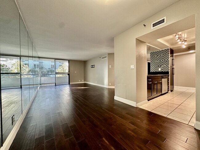 Dining to living - 600 W 9th St Condo Unit 406