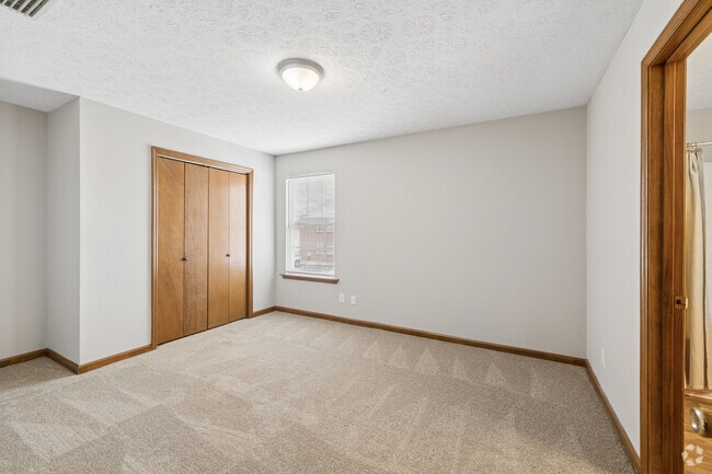 The Willow 2BR, 2BA - 886SF - Primary Bedroom - Laurel Wood Apartments