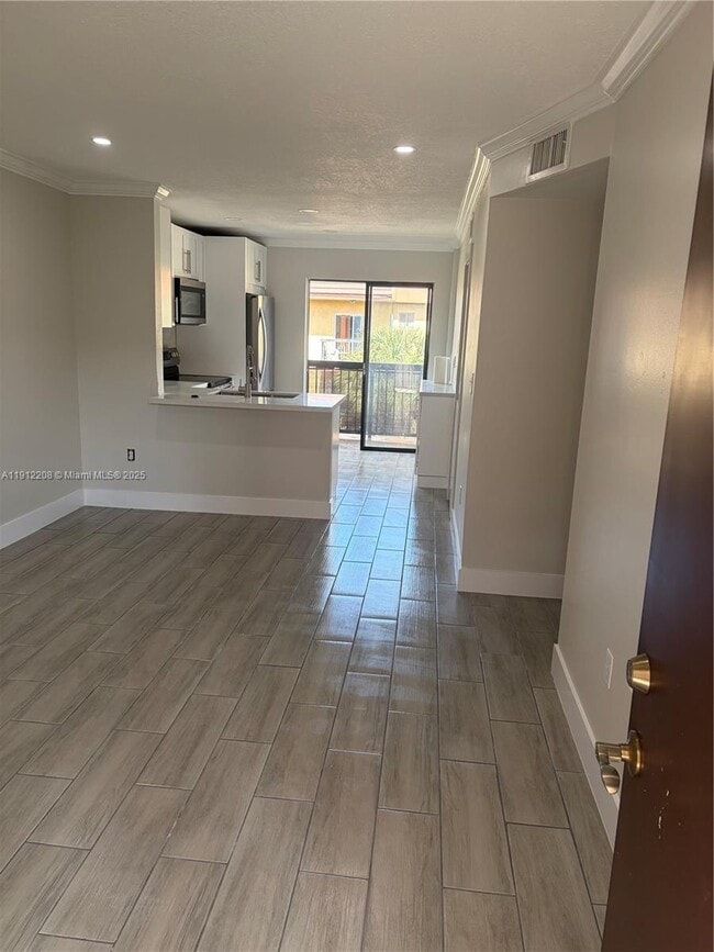 Building Photo - 5460 W 21st Ct Unit 410