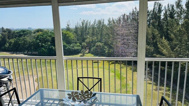 Building Photo - 3150 N Palm Aire Dr Unit 801