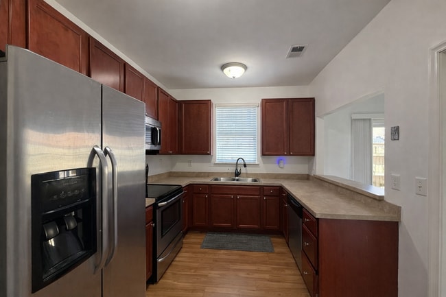 Photo - Spacious End-Unit Condo with Dual Primary Suites & Bonus Room