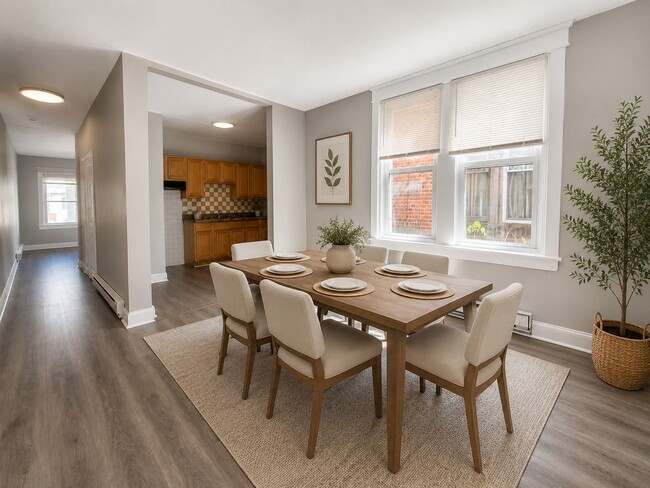 Photo - Spacious 3-Bedroom Rental with Front Porch, Backyard & Basement