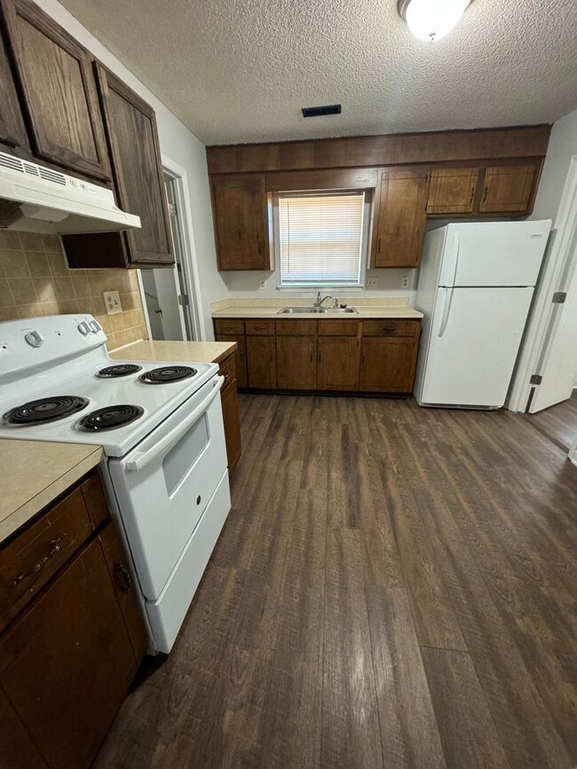 Photo - 3-Bedroom, 1.5-bathroom Brick Home with Garage ***RENT SPECIAL: FIRST MONTH FREE RENT!!!***