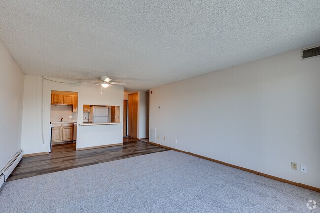 2BR, 2BA - 1,115SF - Living Room and Kitchen