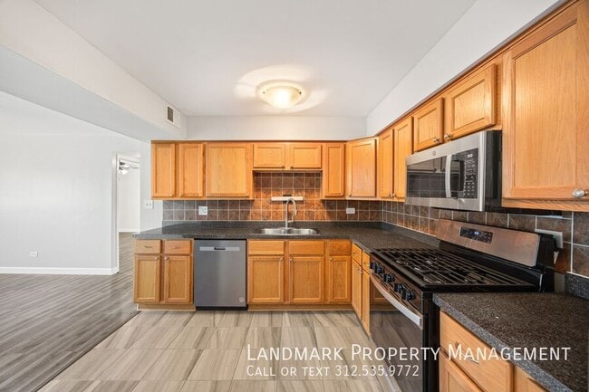 Photo - 10440 Natoma Ave Unidad 6