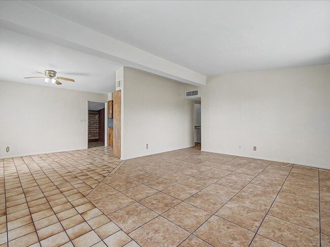 Photo - Charming 3-Bedroom Home with Spacious Yard & Versatile Storage!