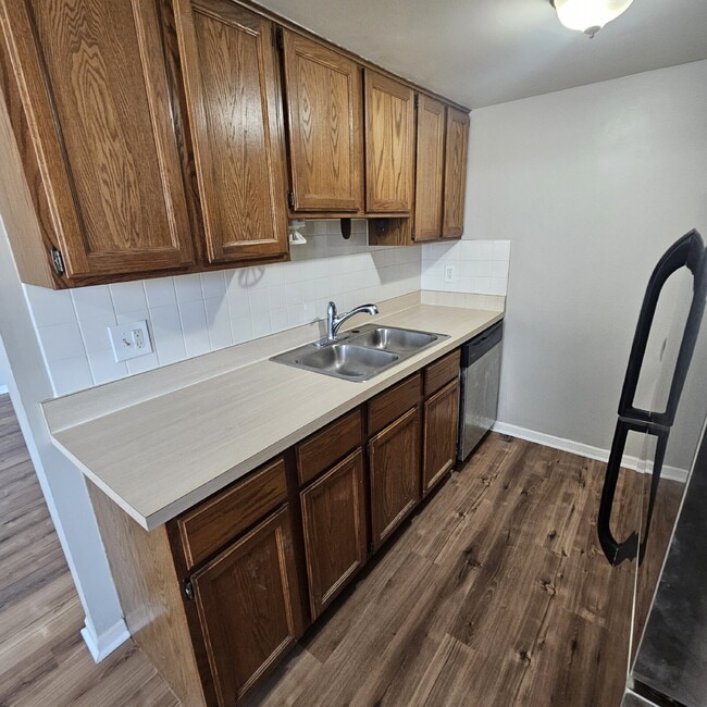 Photo - 2-Bedroom, 1 Bathroom Condo with New Laminate Flooring Throughout The Main Living Area, Kitchen w...