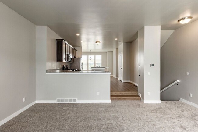Photo - Spacious 4-Bedroom Townhome with Guest Suite, Modern Finishes & Prime Herriman Location