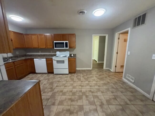 Photo - Coming Soon! 4 BR/2BA | Newly Renovated Single Family Home | 1-Car Covered Parking | Gated backyard