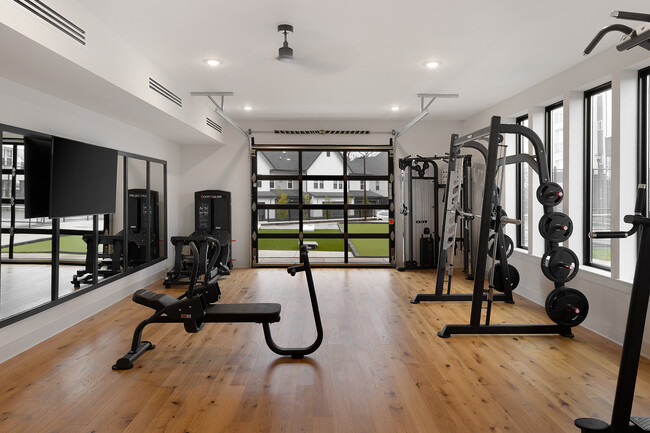 Unleash your fitness potential in this state-of-the-art apartment gym. - Livano Springdale
