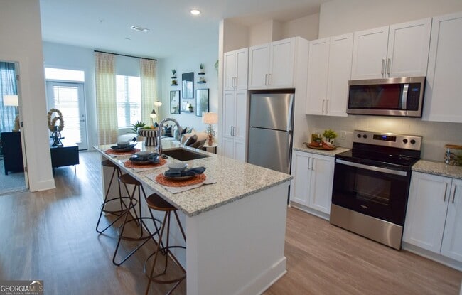 Building Photo - 2620 Mall of Georgia Blvd Unit 1033 Rental