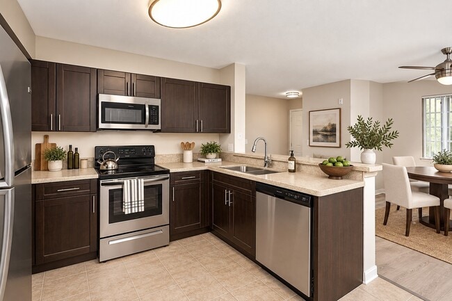 Elevate your cooking experience in this modern kitchen at Club Lake Pointe, featuring sleek appliances and stylish finishes. Perfect for culinary enthusiasts, this space combines functionality with elegance. Schedule your tour today!