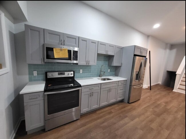 Building Photo - 5720 W Girard Ave