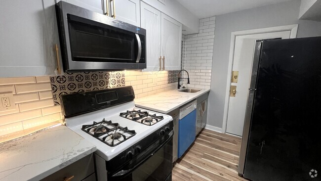 Building Photo - 5737 Hobart St Unit Apt 1