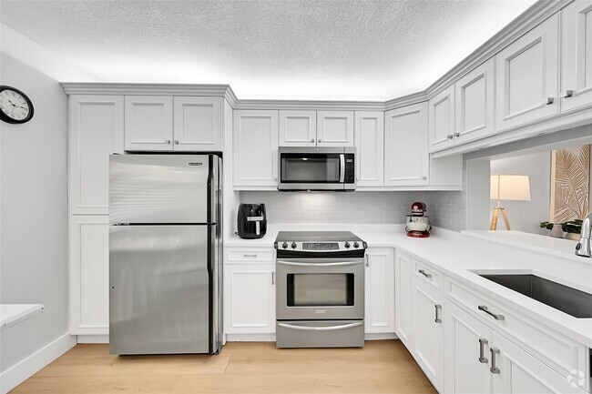 Building Photo - 2660 Carambola Cir N Unit 202 Rental