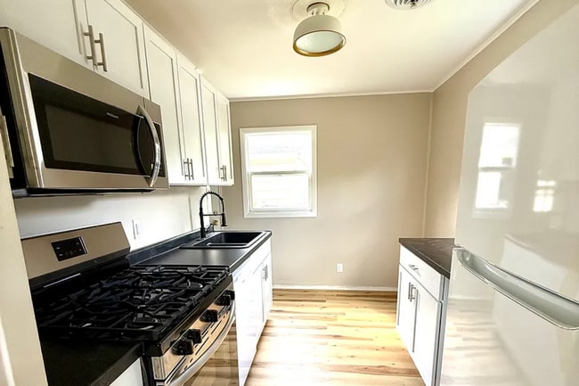 Photo - Sun-Filled 2BR Home on Corner Lot with Spacious Garage