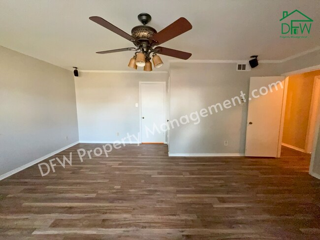 Photo - Charming 3-Bedroom Home with Sunroom & Spacious Backyard in Irving!