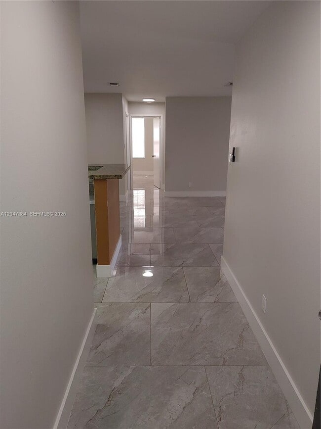 Building Photo - 11225 W Atlantic Blvd Unit 106