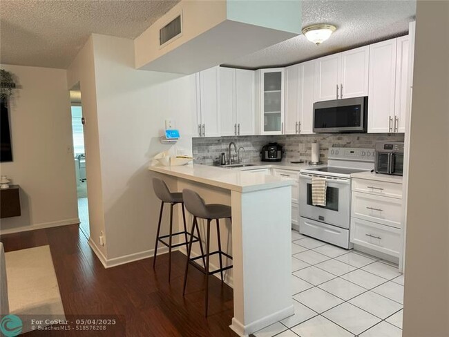 Photo - 5514 Courtyard Dr Unidad 5514 Rental