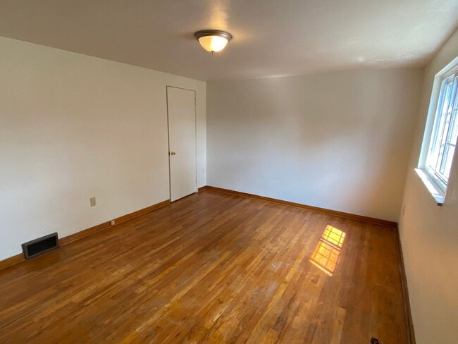 Photo - Charming Two Bedroom Townhome with a Private Basement & a Shared Backyard Space! Call Today!