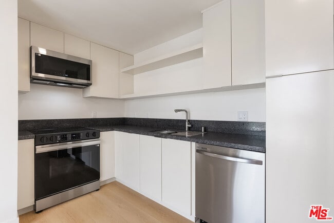 Photo - 8561 Belmont St Unit 2