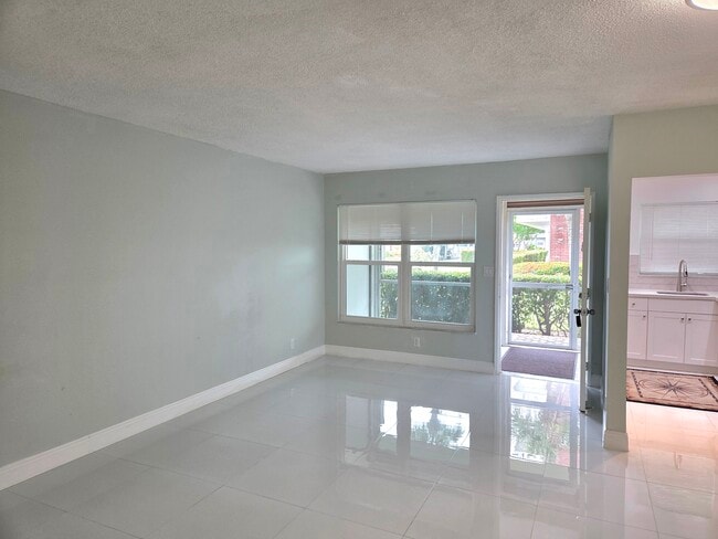 Gleaming Tile Floors - 1971 SE 5th Ct Unit #105E