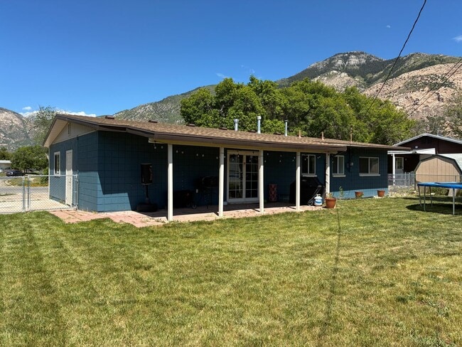 Photo - Beautifully remodeled home with central air, 1 car garage, RV parking and covered patio
