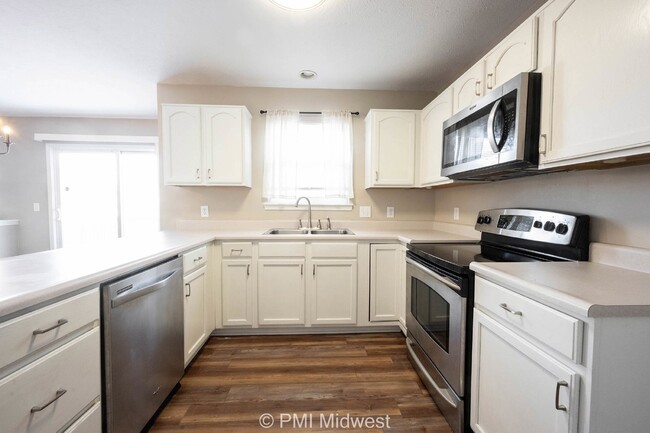 Photo - "Spacious 4-Bedroom Gem with Finished Base... Apartment