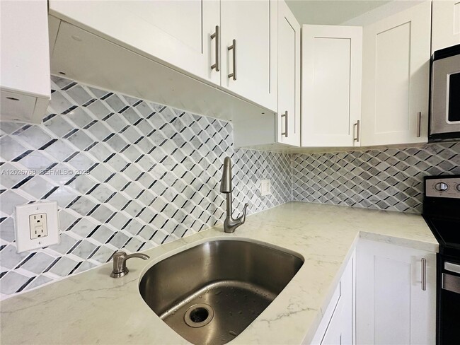 Photo - 850 SW 133rd Terrace Unit 105B