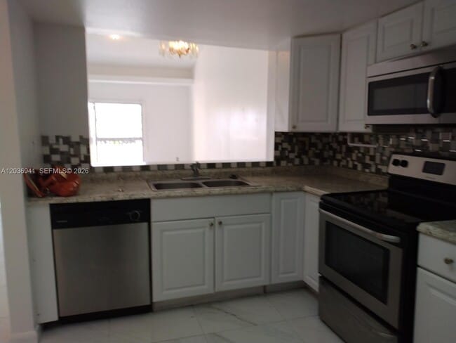Photo - 805 SW 113th Way Unidad 805