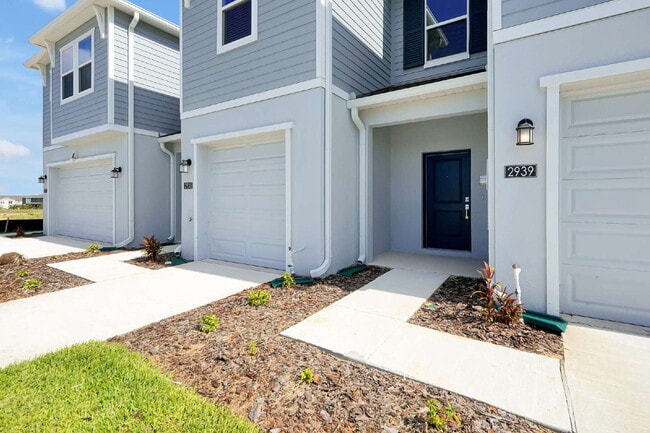 Photo - Beautiful New 3-Bedroom Townhome in Davenport — Includes Resort Pool, Modern Clubhouse & Family P...